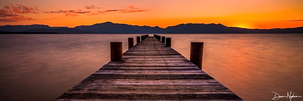 Pier over Lake Tahoe with brilliant Red and Orange Sunset Limited Edition Photograph as Fine Art Print