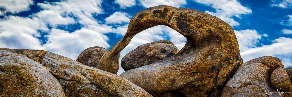 Rock Arch with Puffy White Clouds Limited Edition Photograph as Fine Art Print